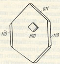 Рис. 119. Таблитчатый кристалл марказита с закономерно наросшим кубиком пирита